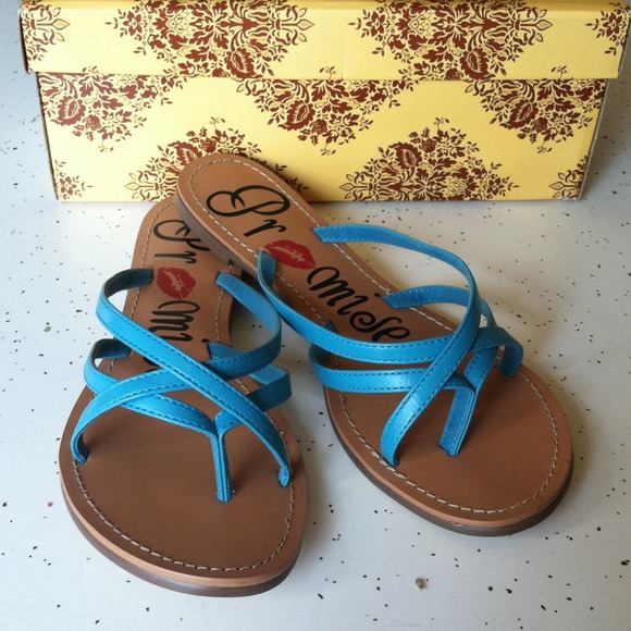 New! Bright blue criss-cross sandals