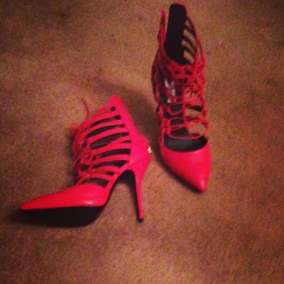 Red strappy pumps