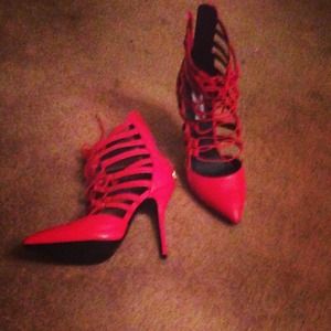 Red strappy pumps