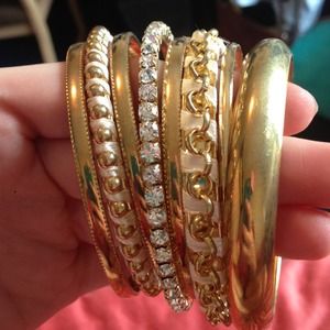 Multiple gold bangles!