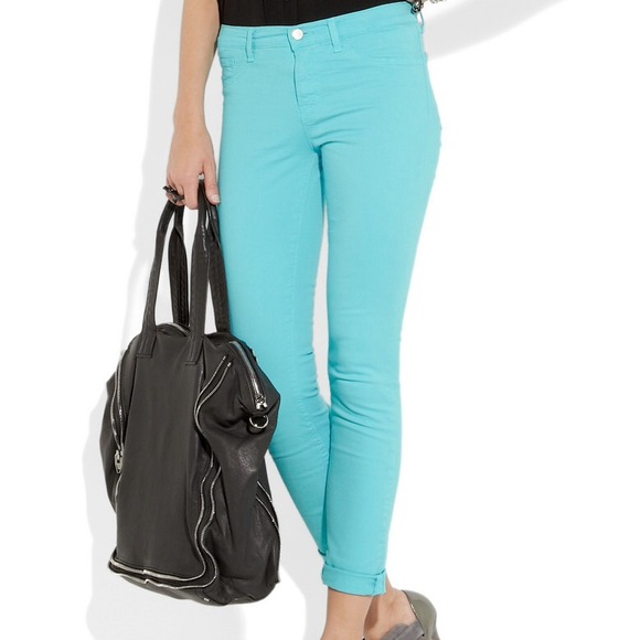Bright neon blue J Brand skinny jeans