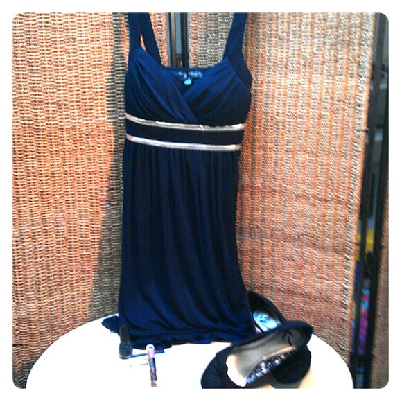 Women's empire waist, sleeveless dress.