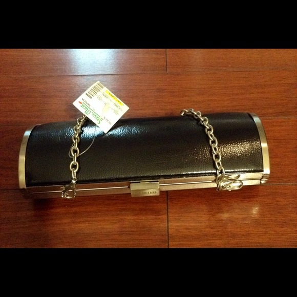 Gorgeous black NWT clutch with removeable strap