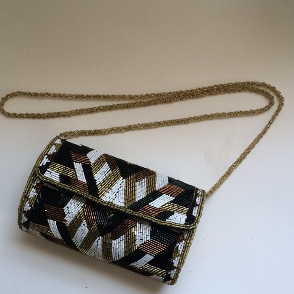 Gold, black and white beaded clutch/purse.