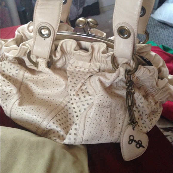 Jessica Simpson cream clam purse