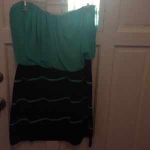 Green and black strapless dress