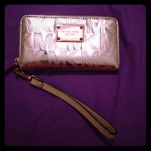 Rose gold Michael Kors wristlet