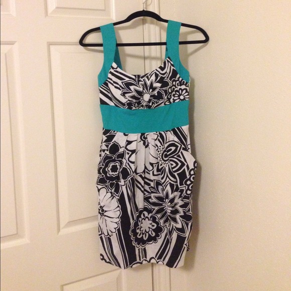 CLASSY black, white, and teal B. Smart dress