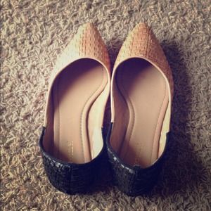 Nude and black woven flats