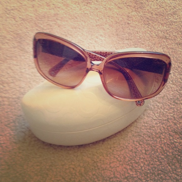 Pink trimmed coach sunglasses