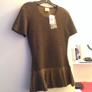 NWT. Black/gold stretch peplum top