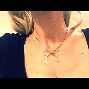Betsey Johnson gold bow necklace.