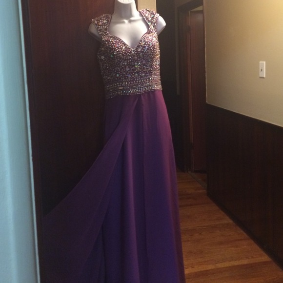 Purple beaded prom dress