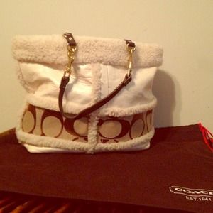 Coach cream fur bucket purse