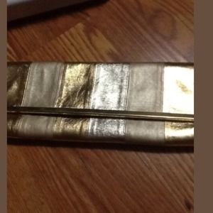Gold lamae clutch never used