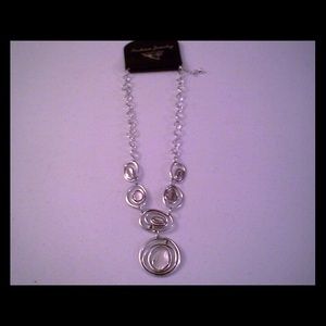 Clear stone in silver setting