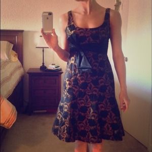 Sweet black and gold cocktail dress with black bow