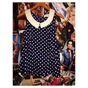Navy pockadot peplum blouse