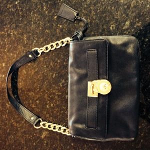 Black shoulder clutch with gold details