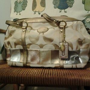 Coach signature handbag.