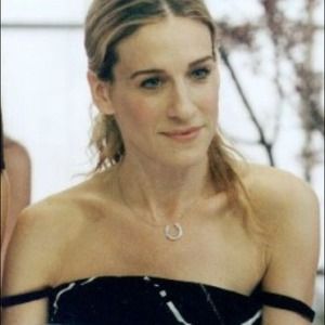 Genuine diamond/14k white gold horseshoe necklace