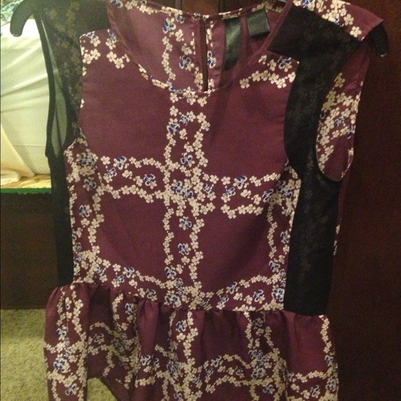 Sleeveless flare top