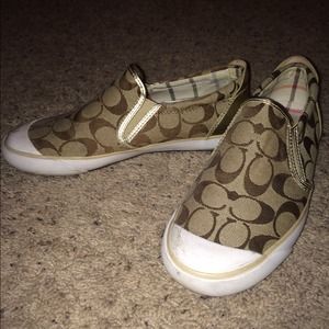 Coach slide on shoes.