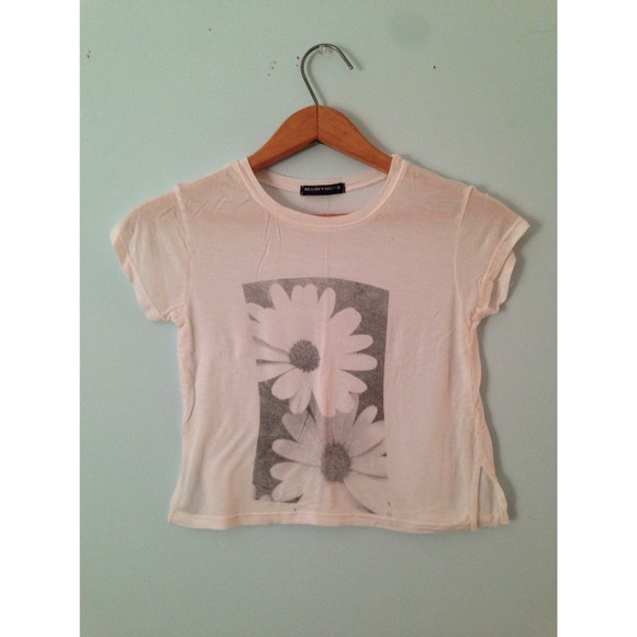 Brandy Melville crop top with daisy graphic.