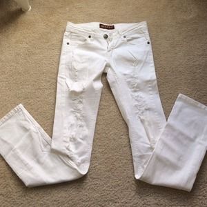 White skinny jeans with distressing