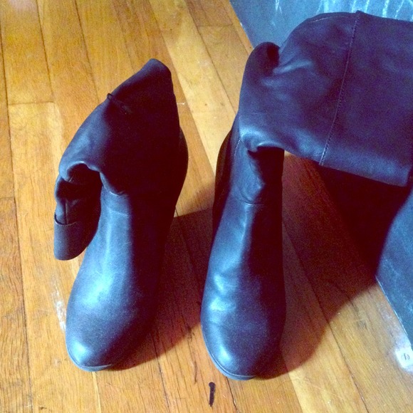 Black knee length boots