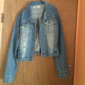 Distressed denim jacket