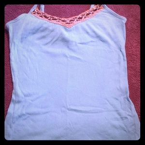 Blue tank with brown stitched detail along top