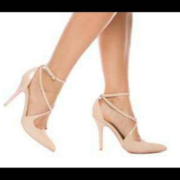 Nude pumps with hot pink bottom