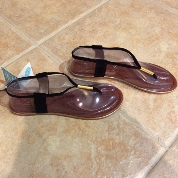 Gladiator black and gold sandals