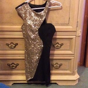 Black and gold one shoulder sequin dress