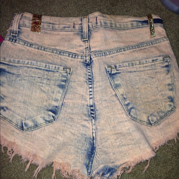 High waisted salmon/peachy colored denim shorts. - Picture 2 of 3