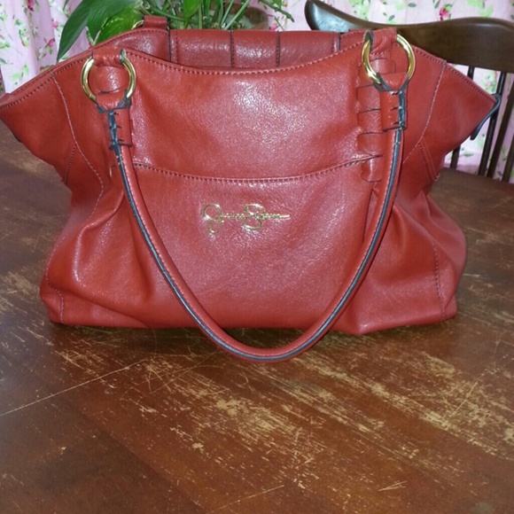Sold Jessica Simpson read purse very good