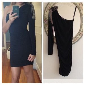 One sleeved little black dress