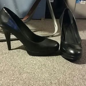 Black platform pumps