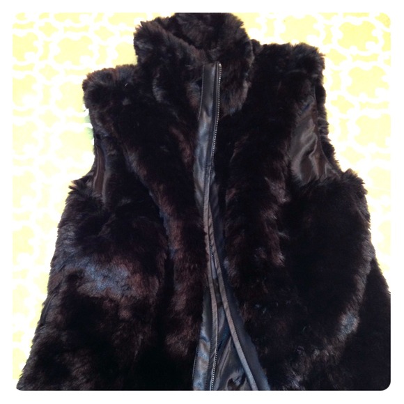 Large black fur vest