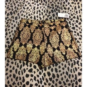 Black and gold baroque print shorts