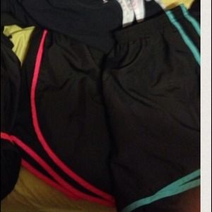 Teal and black nike shorts