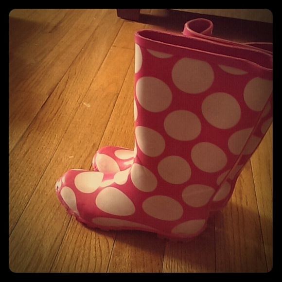 Pink poka dotted rain boots