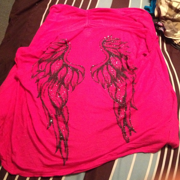 Pink cover with black angel wings on back. - Picture 1 of 3