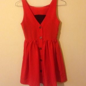 Red, buttoned dress.
