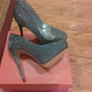 Glitzy sparkling silver platform heels
