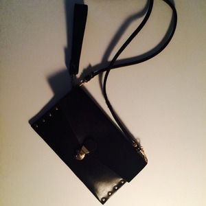 Black studded envelope style clutch