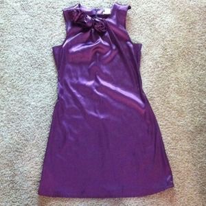 Purple silk dress with flowers on the neck