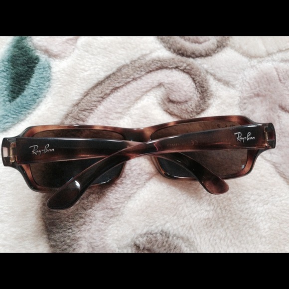 Ray- Ban sunglasses.