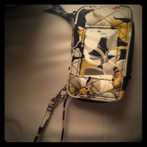 Vera Bradley dogwood pattern smartphone wristlet.
